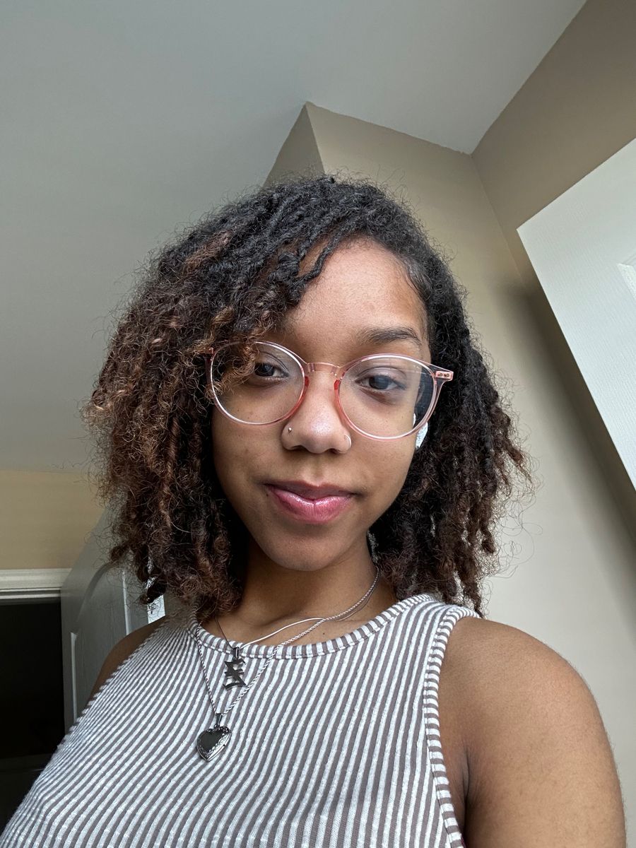 Side Part with Locs Swept Over One Shoulder