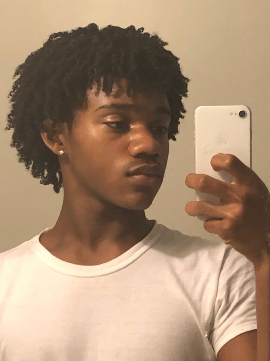 boy on Coils locs