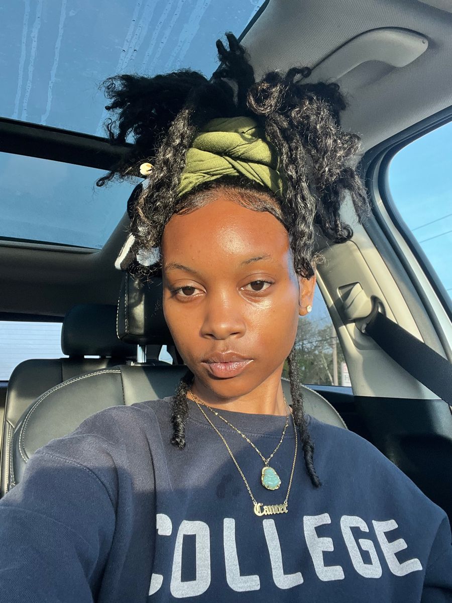 Locs Wrapped in a Silk Scarf Updo