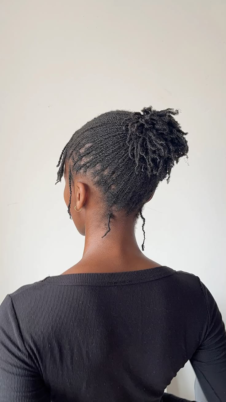 girl on locs facing backward