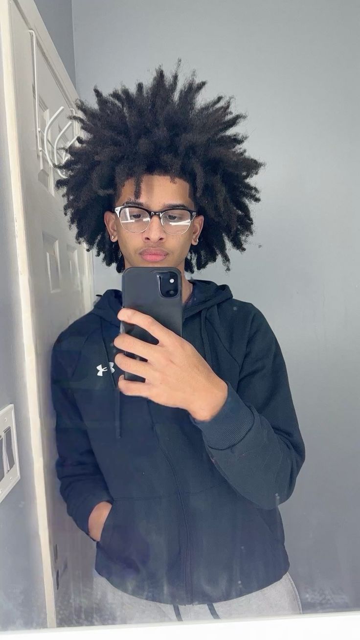 a fair man with locs 